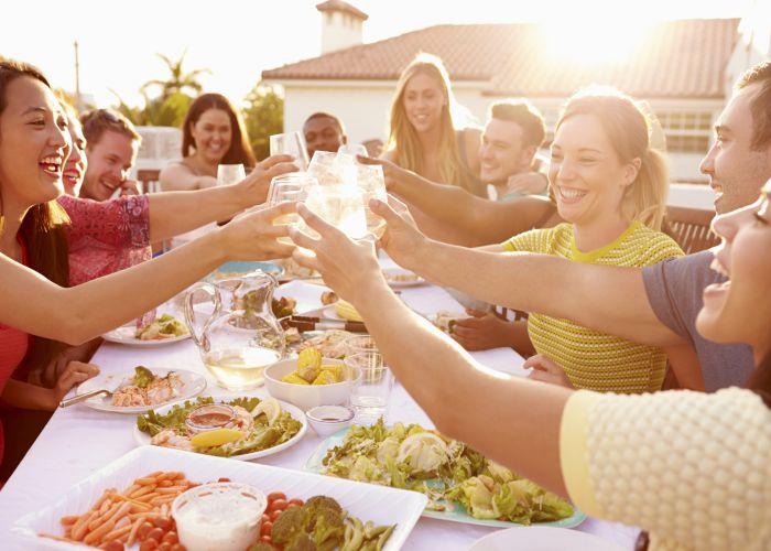 Cheers eating and drinking monkeybusiness depositphotos