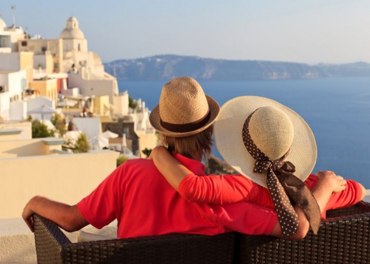 Couple in Santorini - credits: NadyaEugene/Shutterstock.com